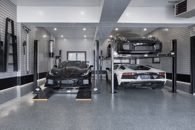 double car lift with parked cars