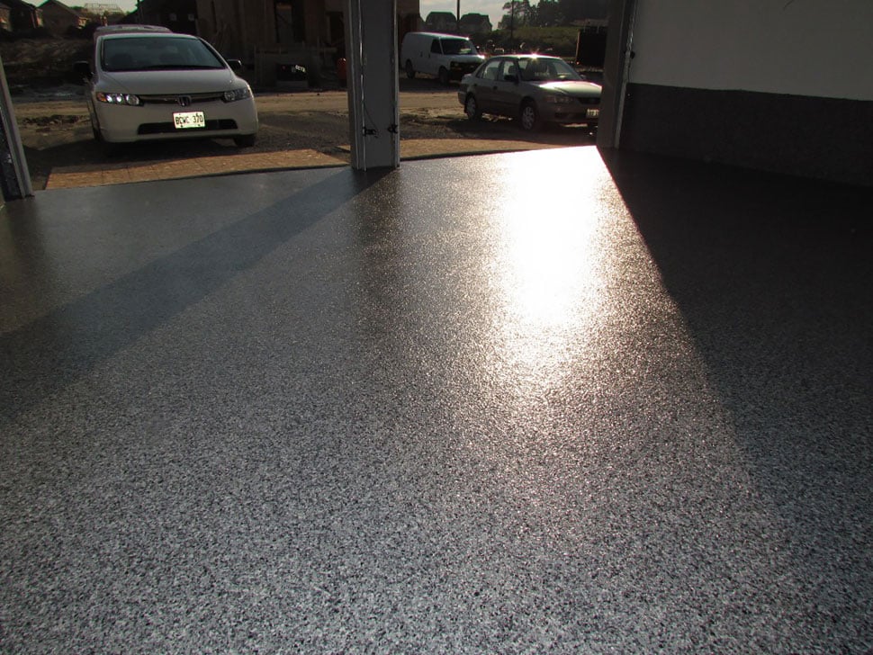 two car garage with fresh floor coating