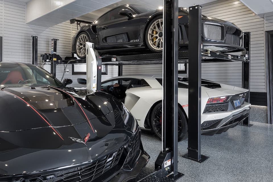 luxury-cars-on-car-lifts
