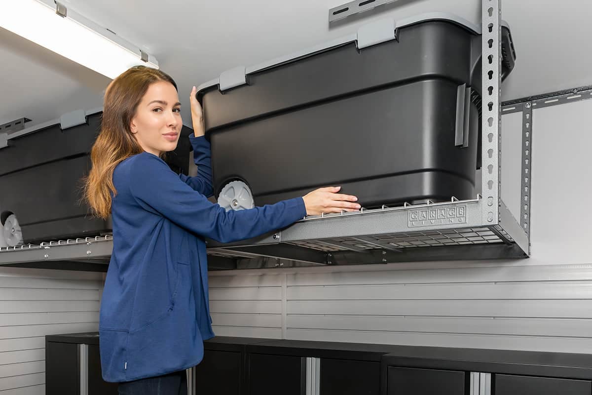 Invest in professional garage overhead storage installation - Overhead storage rack with bin - Garage Living