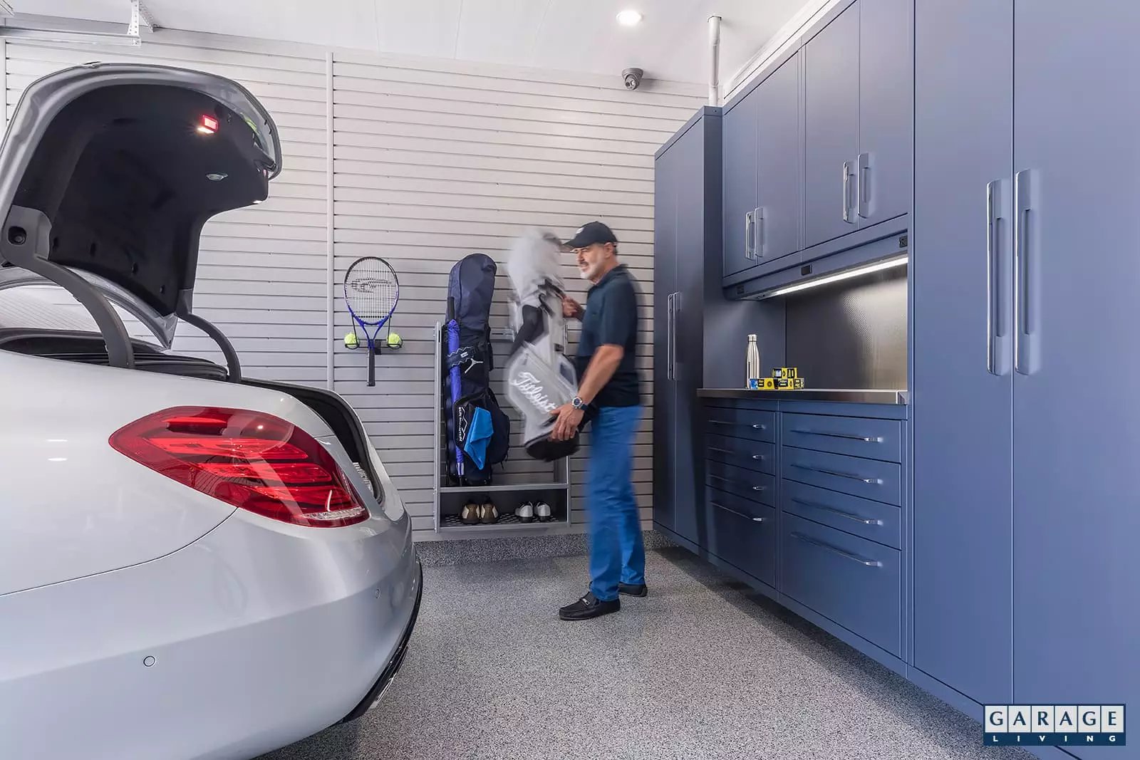 Harbor Blue with a Slatwall - mounted golf rack - Garage Living